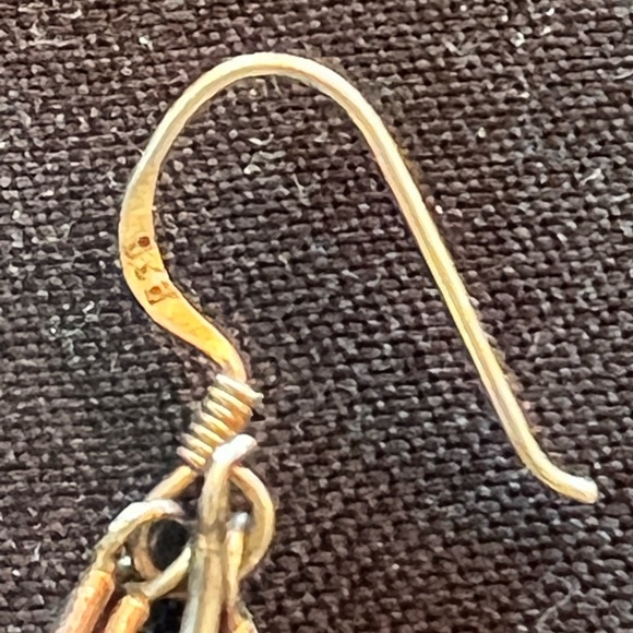 Silver earrings.  Only one.  Worn once and then I lost one - Picture 2 of 3